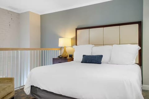 Sink into crisp linens and unwind under warm bedside light.