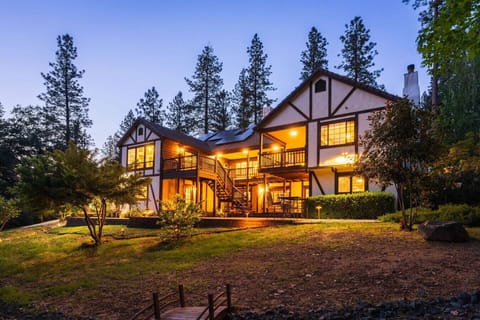 A view of the Manor house from the back yard at dusk.  Spectacular!