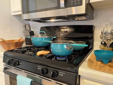 New cookware, tools for food prep, spices and wine glasses all ready for you.