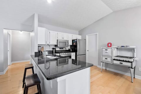 The open, airy kitchen offers ample space & every home comfort