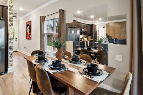 Enjoy meals at the sleek dining table for six.