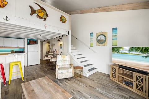 Stairs lead up to the loft bedroom