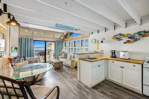 Open layout with living room, kitchen and dining on the main floor