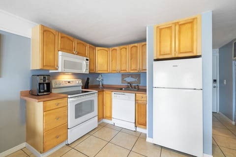 The full kitchen has everything you need for short or long stay