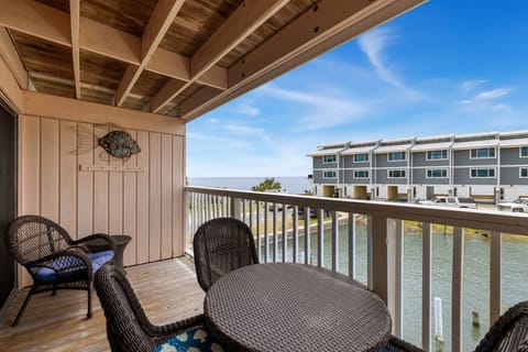 Private deck with seating and dining table
