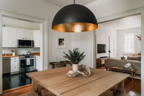 Dining area connected to kitchen and living room.