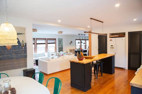 Dining area overlooking living room and kitchen