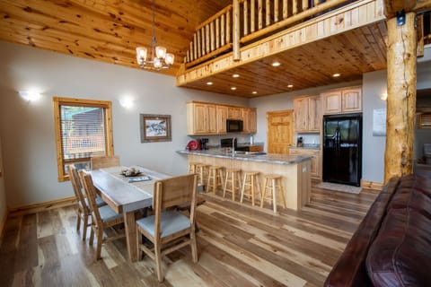 The open kitchen design keeps everyone included during meal prep, allowing your group to gather and enjoy the time together.