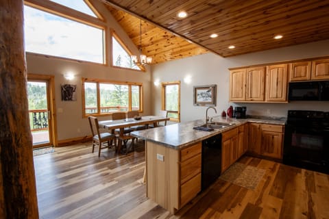 The spacious kitchen offers plenty of room, making it easy to prep large meals for your group.