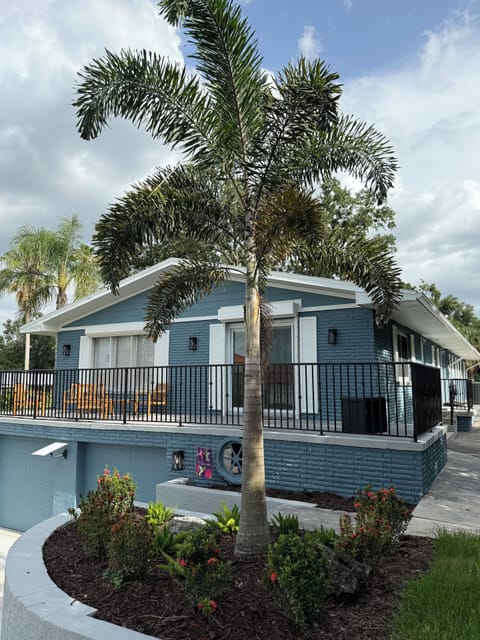 Sip coffee on the balcony overlooking Lake Hollingsworth walking path