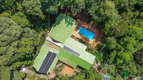 Escape to a secluded eco-lodge surrounded by lush rainforest, featuring solar-powered sustainability and a stunning outdoor pool. Relax in total tranquility, just steps from nature’s beauty. Your tropical paradise awaits!