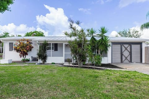 Front of property with driveway for parking 2 cars