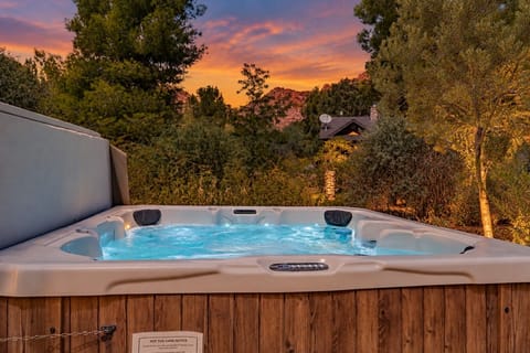 Hot Tub with forest views at twilight
