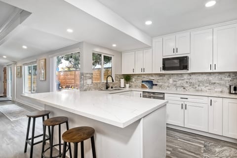 Fully equipped kitchen with stainless steel appliances