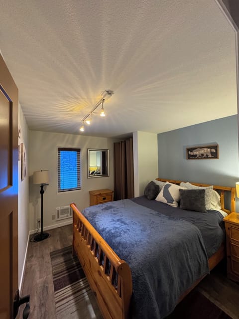 Front bedroom with one queen bed