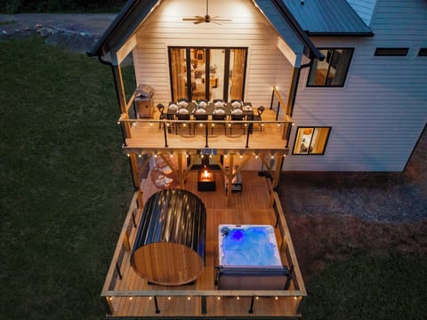 A cozy backyard retreat with warm evening lighting.
