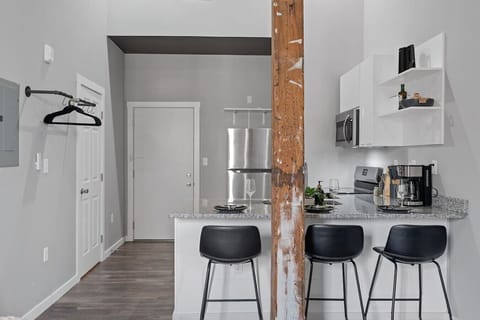Our kitchen island with three stools