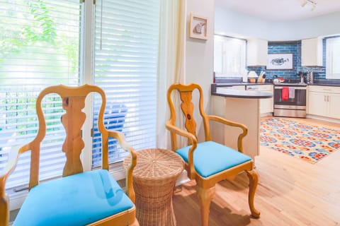 There are two additional chairs that can be used at the table.