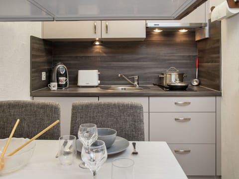 Countertop, Kitchen, Sink, Plumbing Fixture, Interior Design, Tap, Flooring, Cabinetry, Furniture, Kitchen Appliance