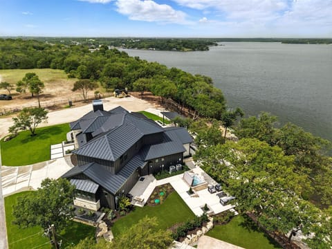 With 5 bedrooms, 5.5 bathrooms, waterfront views, and a backyard built for entertaining, this luxury estate has everything you need for a memorable vacation!