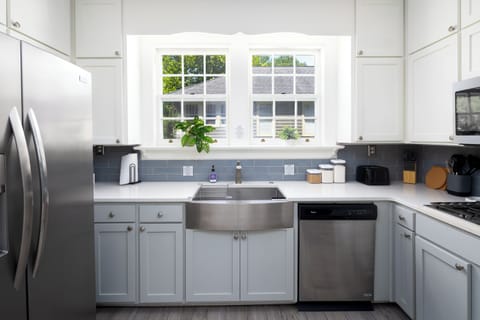Kitchen sink with a view - windows above make cooking feel even more refreshing