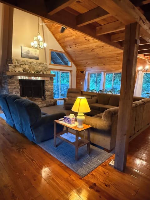 A large gathering space in the main cabin area with 72" TV with Starlink WIFI!