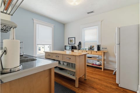 Kitchen - Spacious counters,  prep island, and coffee station ready and waiting 