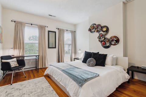 Bedroom - Enjoy a restful night's sleep in this king-sized bed. 