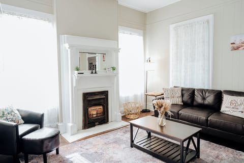 A warm and inviting living room with comfy seating.