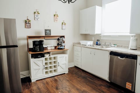 Spacious kitchen fully stocked for your stay; stove, oven, dishwasher, refrigerator, coffee maker and all the essentials for cooking and dining.