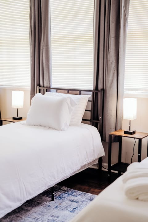 Bright and inviting space featuring two comfortable single beds