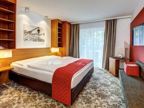 *Double room design half board - AlpenParks Hotel & Apartment Maria Alm Apartment in Maria Alm