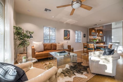 Stretch out and enjoy this roomy living space with a variety of comfortable seating choices.