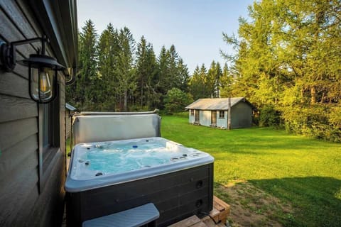 Private hot tub offering peaceful views for ultimate relaxation.