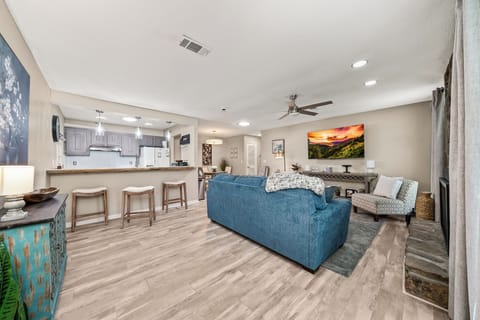 Living Room, Bar Counter with Pass-Thru to Kitchen - dining area in foreground