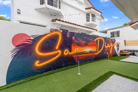 Outdoor Oasis: Vibrant mural and putting green invite fun in the San Diego sunshine!