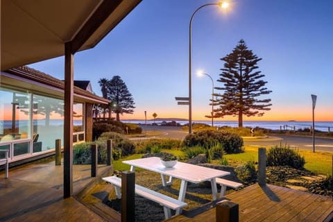 Watch the sunset paint the horizon from the front deck, where sea and sky meet in perfect stillness.