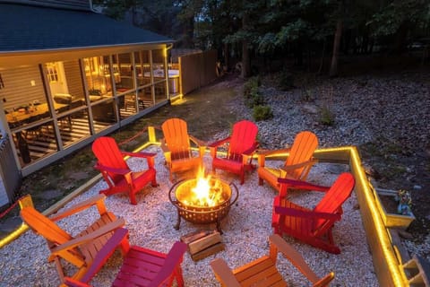 Wood-burning firepit with seating for 8. Firewood provided.