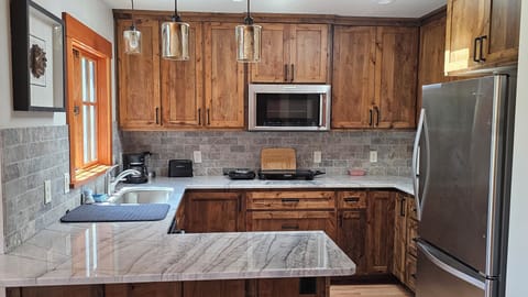 Kitchen with dishwasher & convection microwave/oven