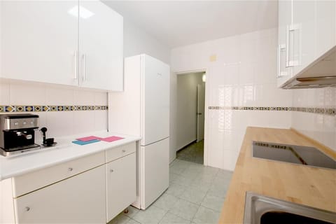 Fully-equipped kitchen from a different angle