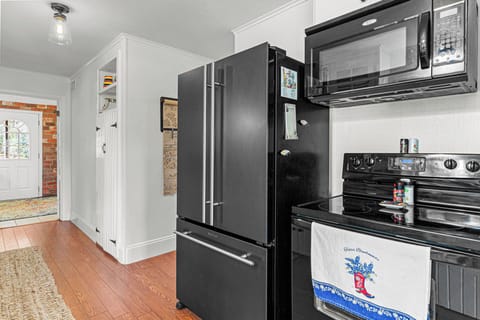 Large sized refrigerator and everything you need to enjoy meals Siri your stay.