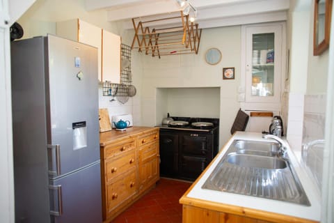 Kitchen with fridge/freezer and electric Aga
