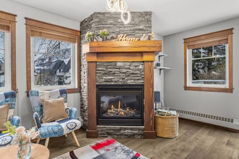 Relax with your loved ones in the spacious open living area, perfect for cozy movie nights on the TV or curling up by the fireplace.