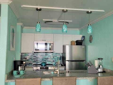Full-Sized Kitchen with Bar Stools