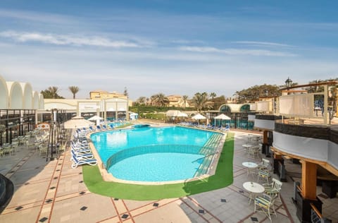 Soak up the day beside a wide, refreshing turquoise pool