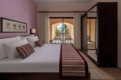 Sink into plush pillows and step onto your sunny balcony.