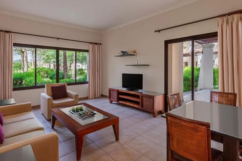 Gather for meals and movie nights in airy comfort.
