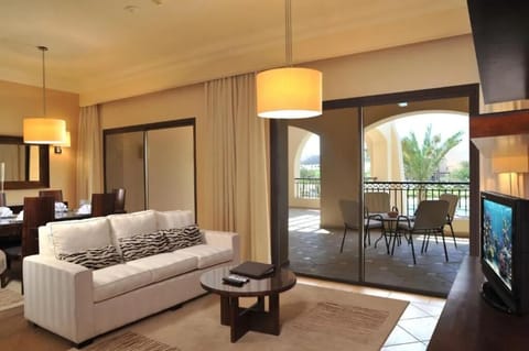 Lounge comfortably while sunlight pours in from the terrace.