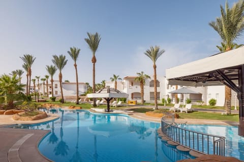 Drift along curving waters with serene garden views.