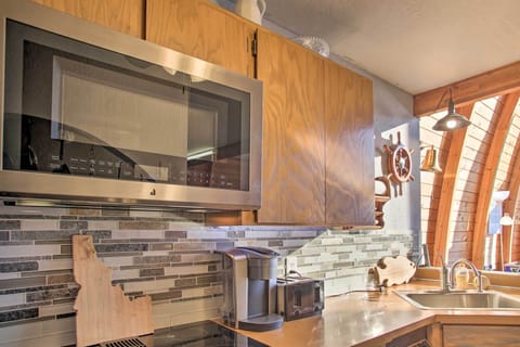 Where Function Meets Charm. This well-designed kitchen is both practical and aesthetically pleasing, making it the perfect spot for culinary adventures and gathering.